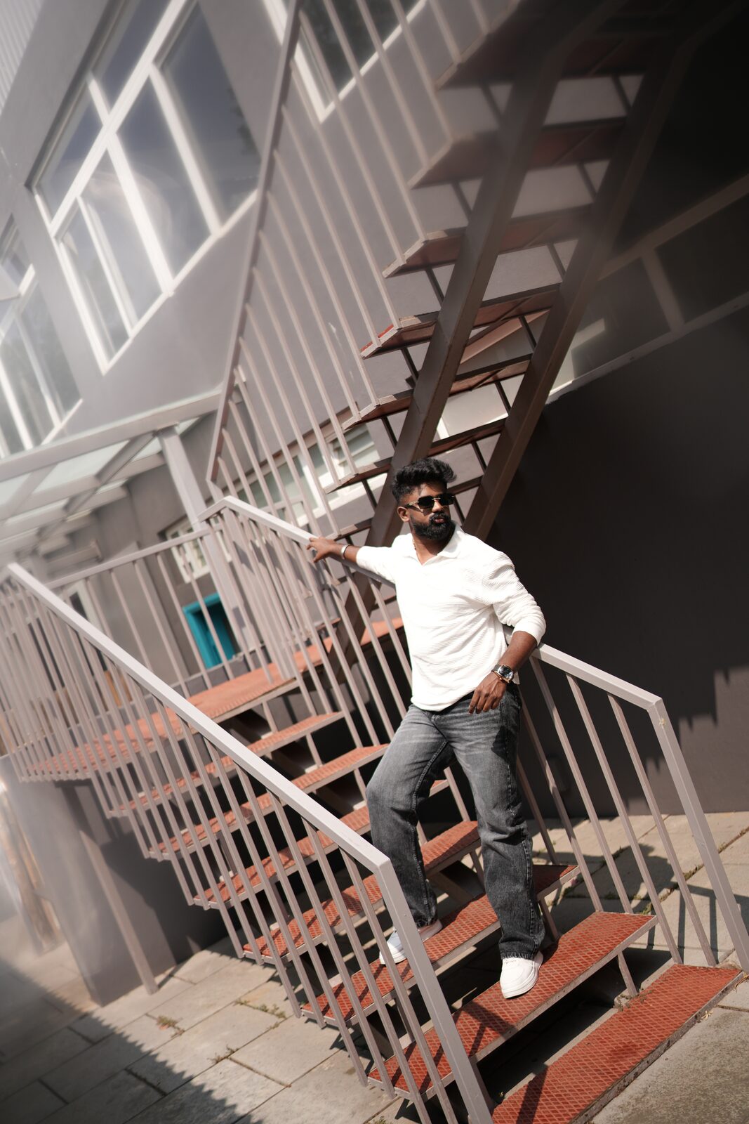 Karthik on a staircase