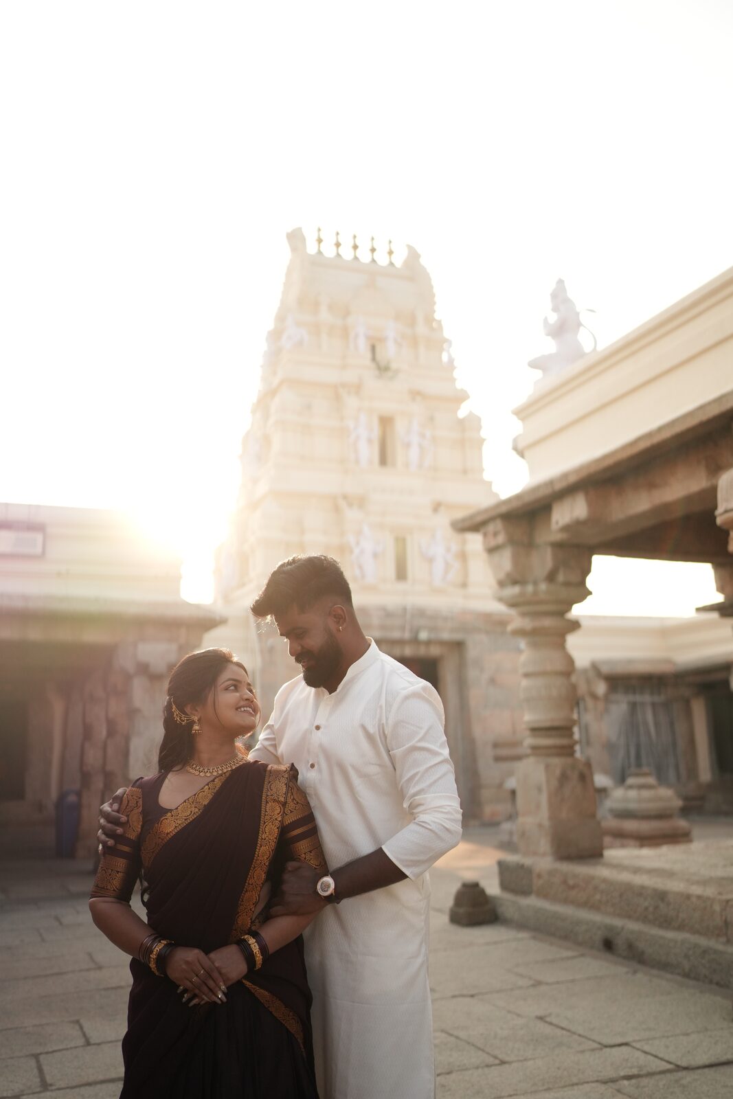 Karthik and Deeksha together before a temple